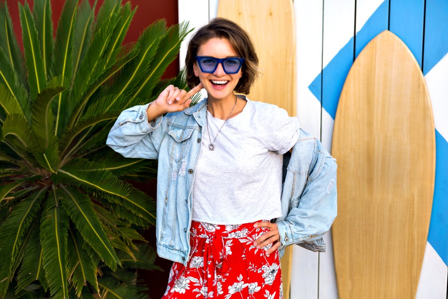 summer-spring-bright-positive-portrait-happy-smiling-brunette-woman-wearing-trendy-feminine-hipster-outfit-smiling-having-fun-posing-front-surf-boards-palms.jpg