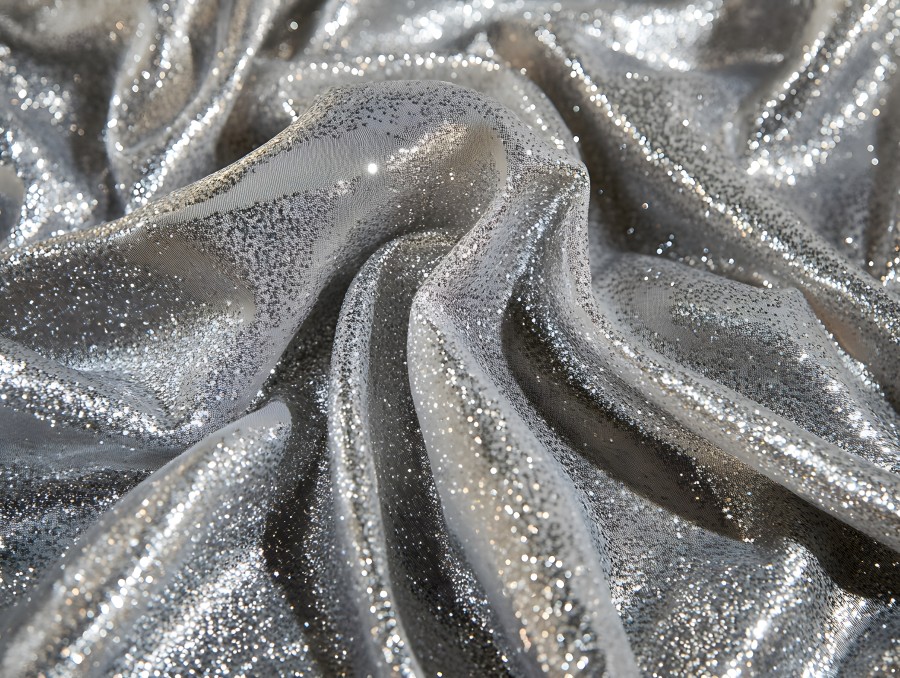 abstract-crumpled-silver-foil-texture-creating-reflective-distorted-surface-ideal-modern-design-backgrounds-futuristic-themes-artistic-interpretations.jpg