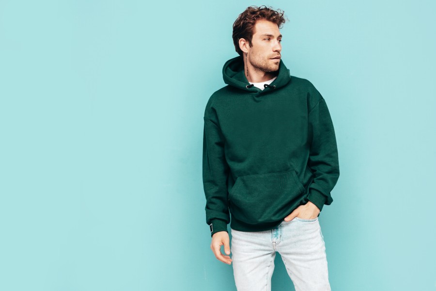 handsome-confident-hipster-modelsexy-unshaven-man-dressed-summer-stylish-green-hoodie-jeans-clothes-fashion-male-with-curly-hairstyle-posing-studio-isolated-b.jpg