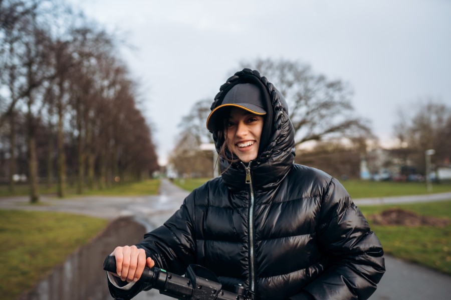 woman-jacket-electric-scooter-autumn-park-riding-electric-vehicles-cold-weather.jpg