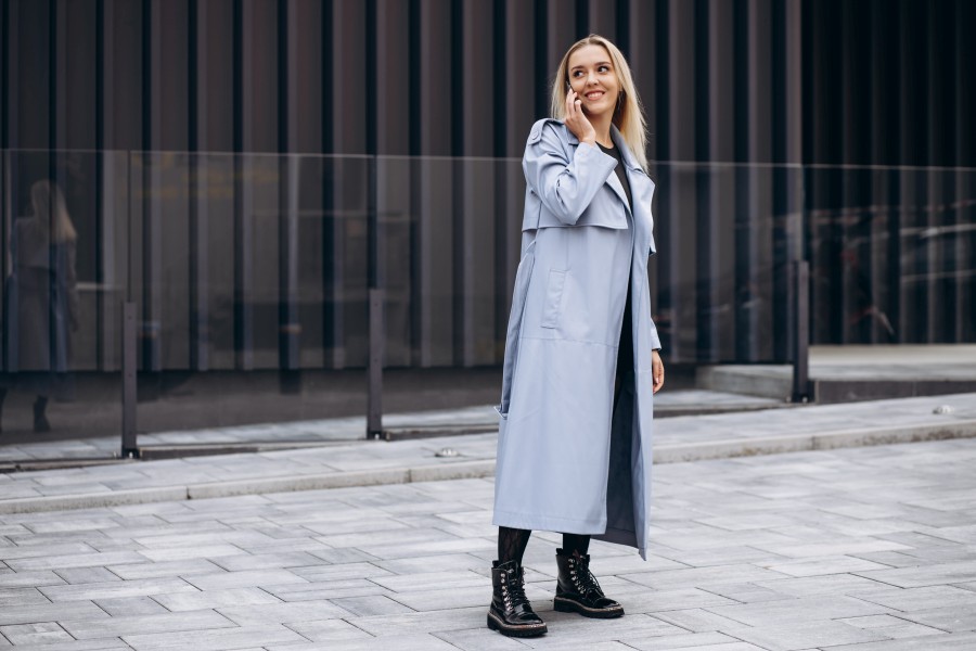 young-attractive-woman-blue-coat-talking-phone.jpg