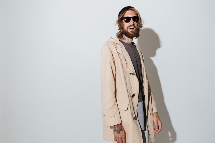 hipster-cheerful-man-wearing-sunglasses-standing-isolated.jpg