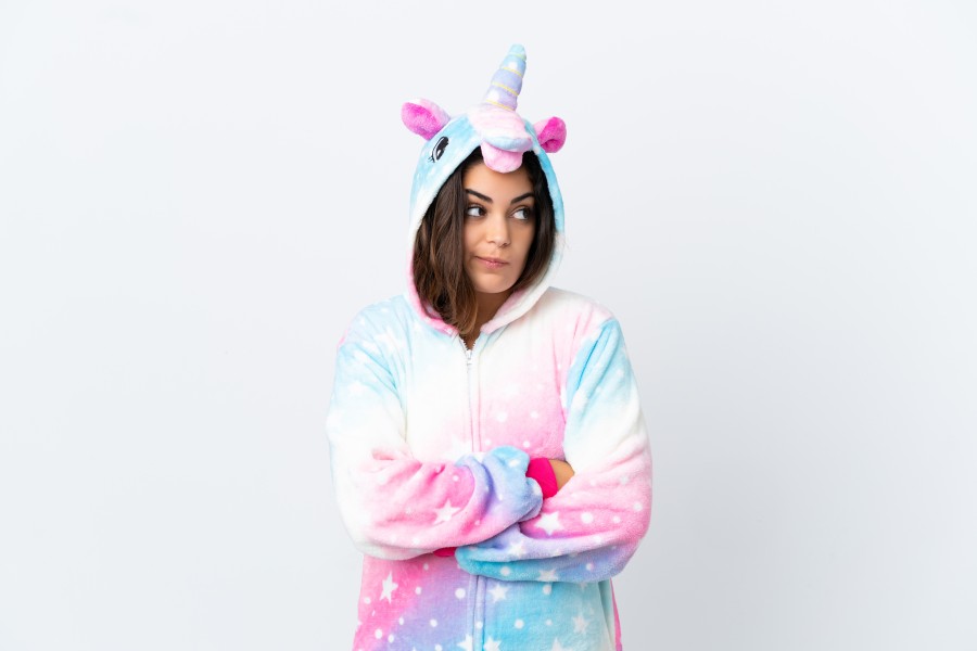 young-caucasian-woman-wearing-unicorn-pajama-isolated-white-background-making-doubts-gesture-while-lifting-shoulders.jpg