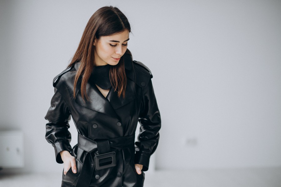 young-woman-model-wearing-long-black-leather-coat.jpg