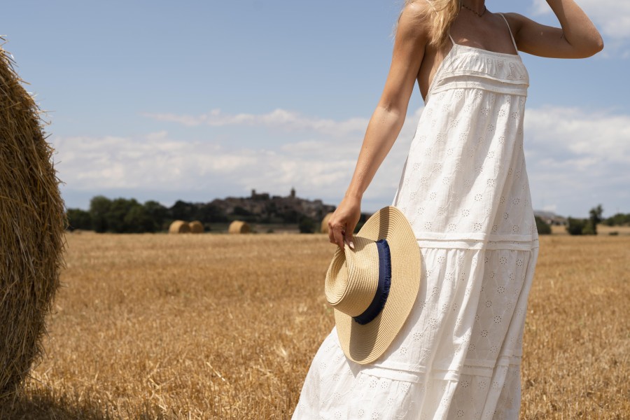 close-up-woman-holding-hat.jpg