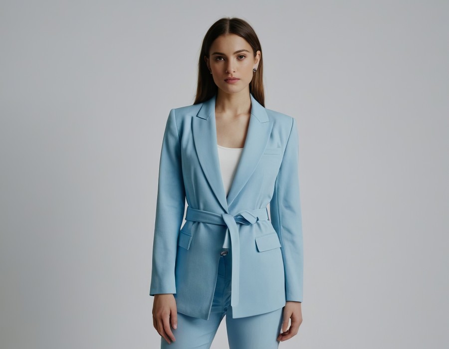 confident-young-woman-stylish-light-blue-blazer-exuding-elegance-professionalism.jpg