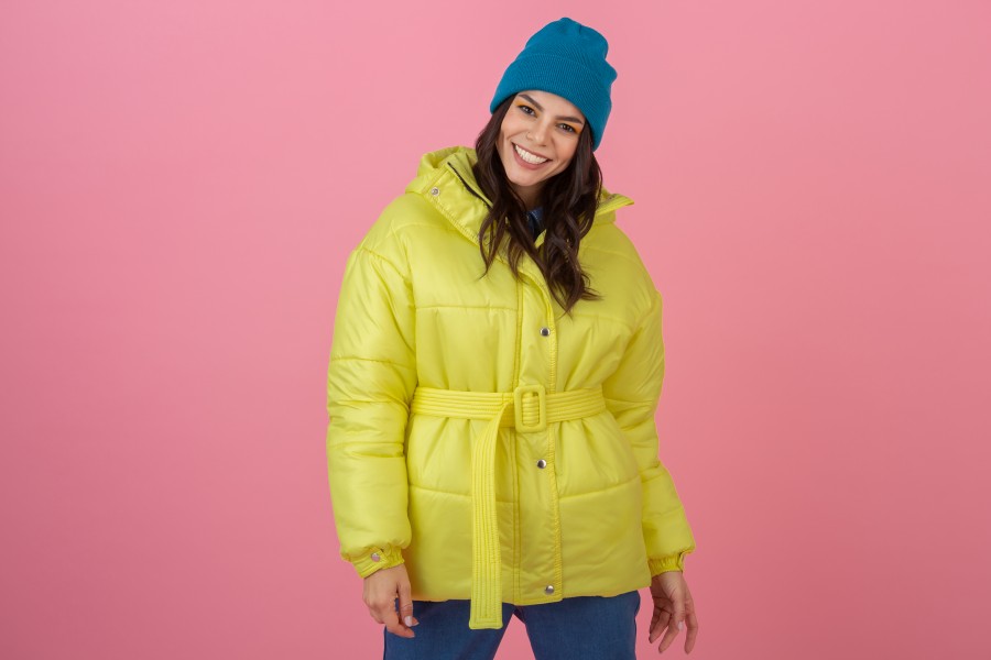 attractive-active-woman-posing-pink-wall-colorful-winter-down-jacket-bright-yellow-color-smiling-fun-warm-coat-fashion-trend-crazy-shocked-surprised.jpg