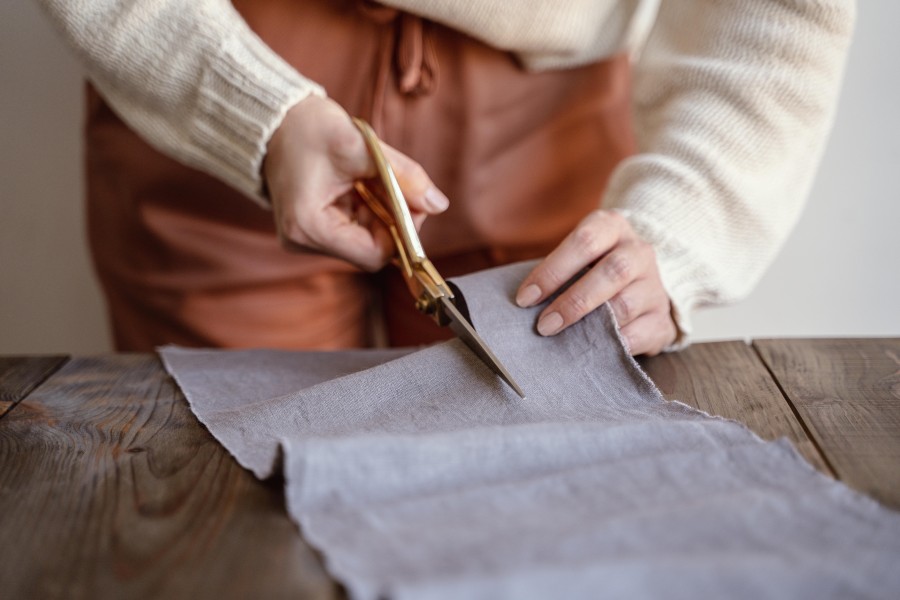front-view-tailor-cutting-fabric.jpg