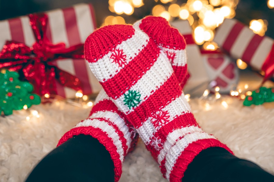 feet-wool-socks-near-fireplace-winter-time-resting-home-close-up.jpg