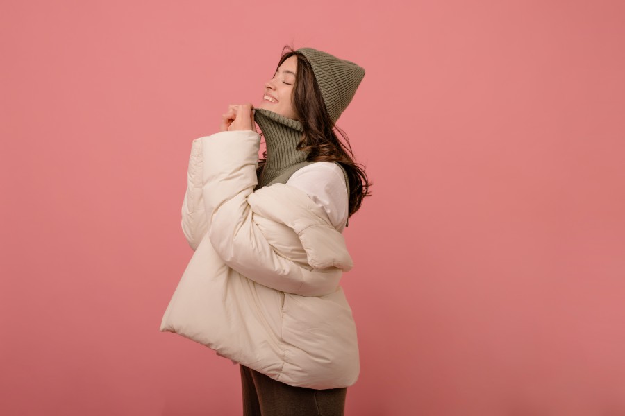 cheerful-young-european-girl-with-dark-flowing-hair-closed-eyes-winter-clothes-studio-people-emotions-lifestyle-fashion-concept.jpg