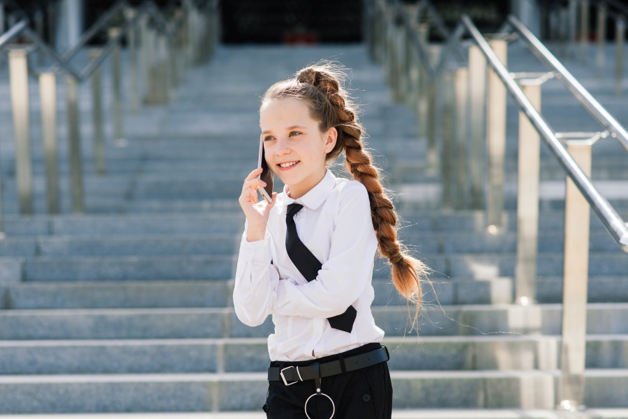 teenage-schoolgirl-talking-phone.jpg