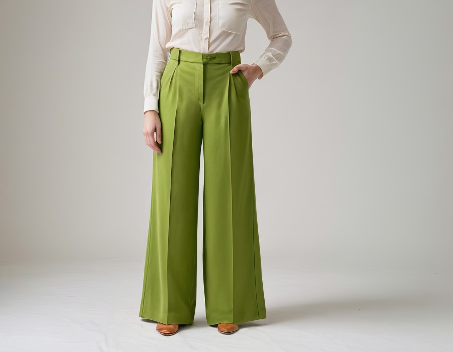fashionable-woman-white-blouse-vibrant-green-wideleg-trousers-exuding-confidence-style.jpg