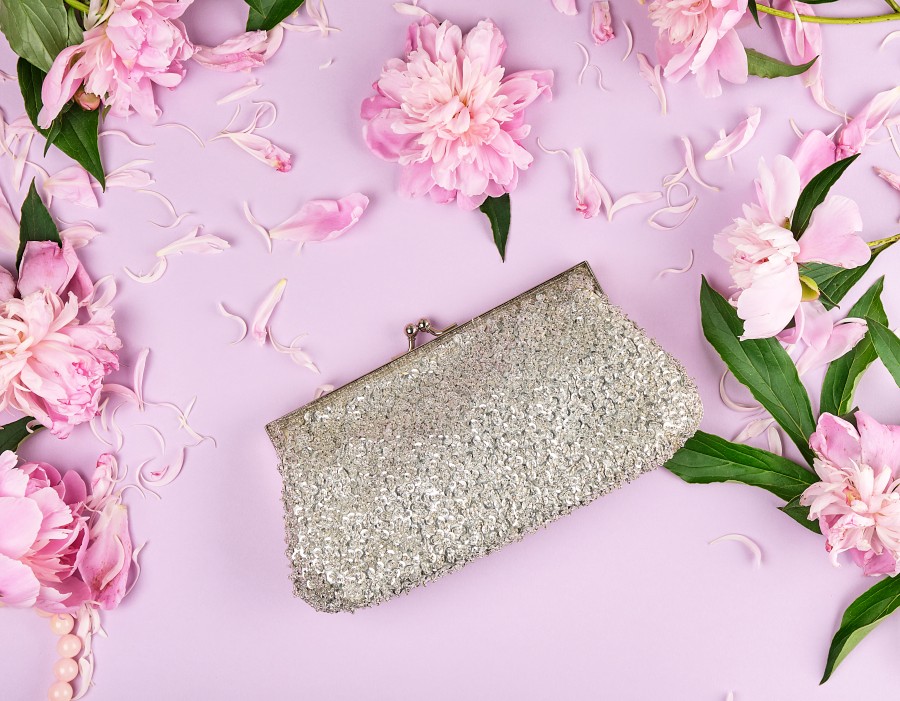 closed-silver-women-handbag-with-sequins-cosmetics.jpg