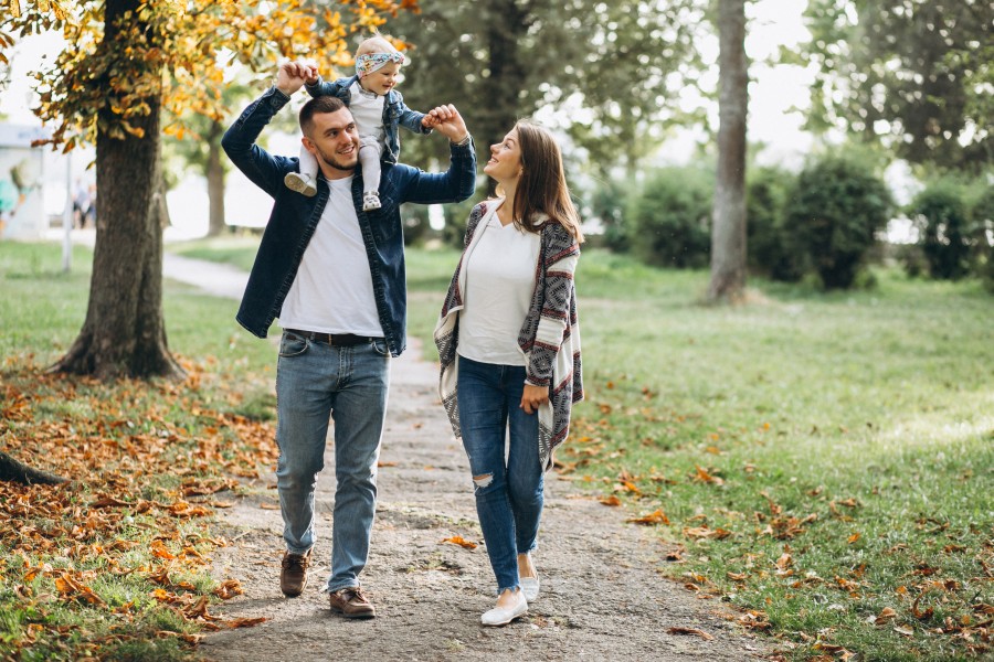 young-family-with-their-small-daughter-autumn-park.jpg