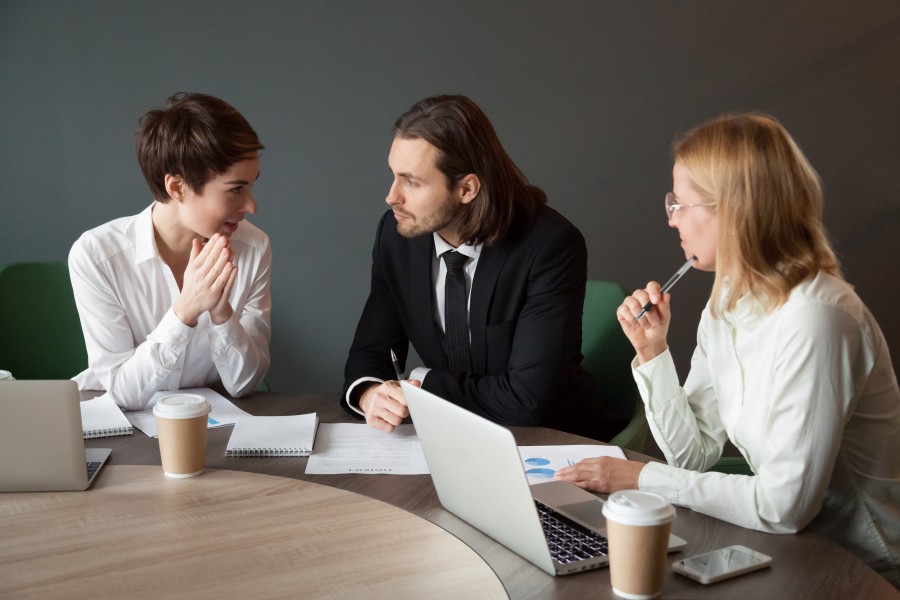 business-partners-negotiating-about-project-meeting-boardroom.jpg
