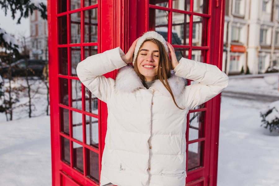 portrait-joyful-amazing-young-woman-warm-white-clothes-chilling-sun-frozen-morning-winter-time-red-telephone-box.jpg