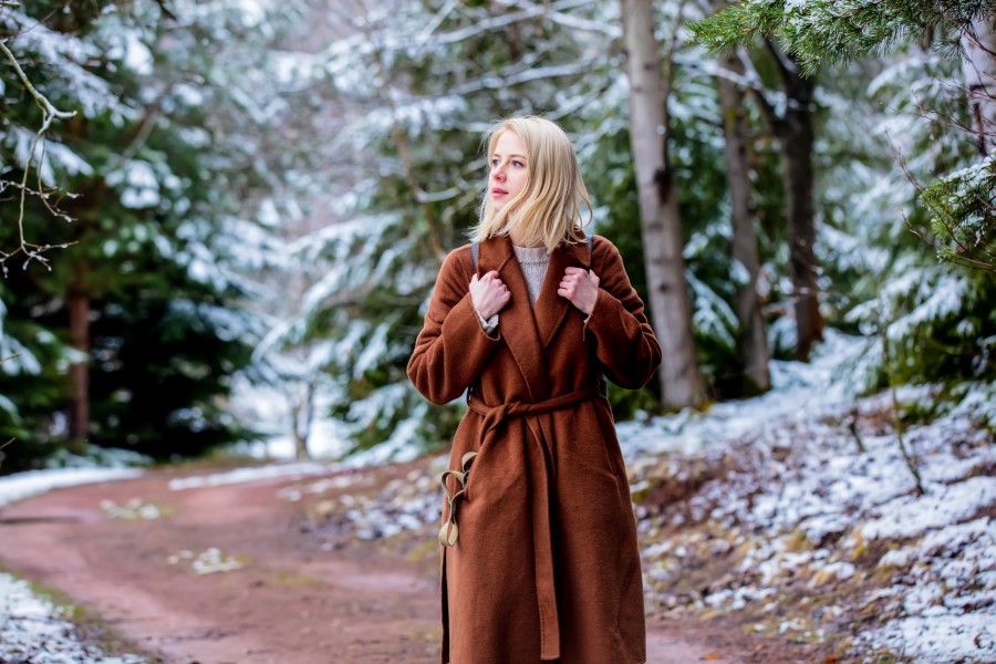 style-blonde-woman-coat-snow-forest.jpg